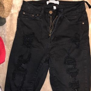 Distressed knee high shorts